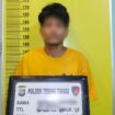 Tersangka K alias K mengenakan baju tahanan warna oranye saat diamankan Unit Reskrim Polsek Tebing Tinggi untuk menjalani proses penyidikan.